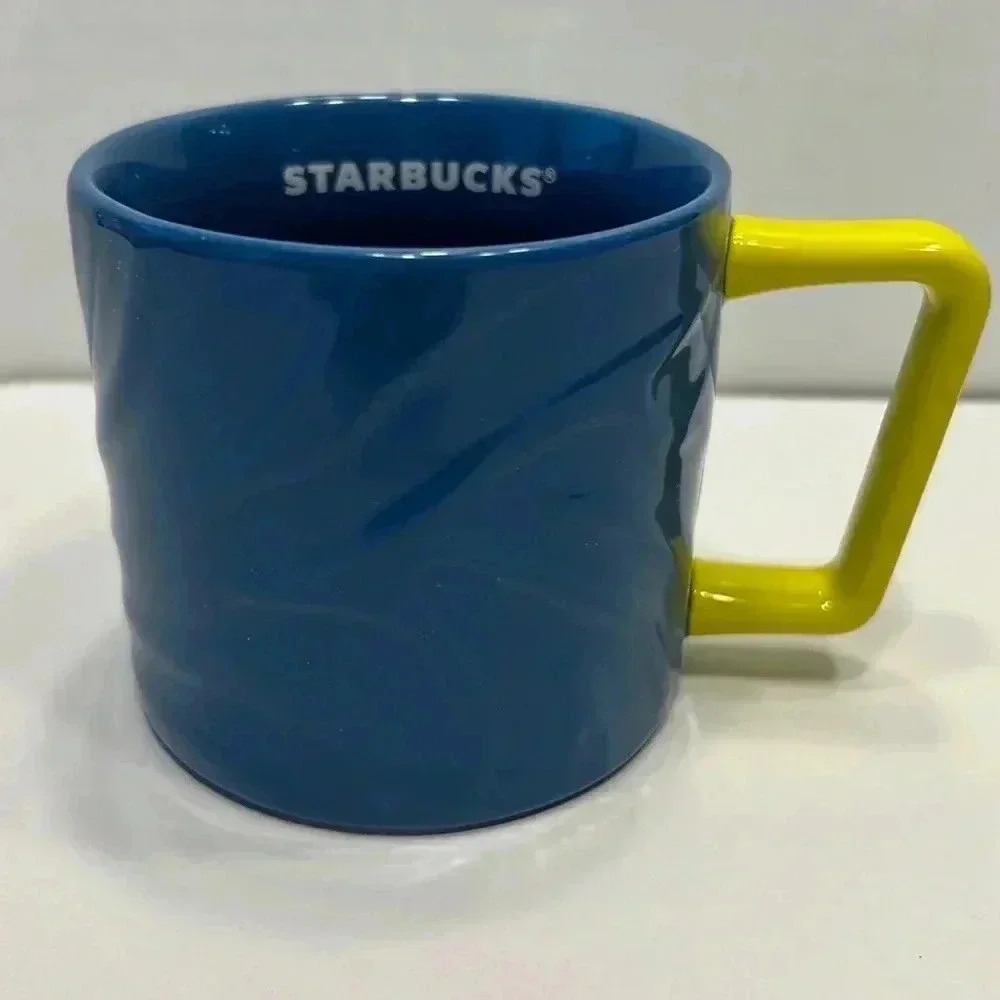 Starbucks blue zebra yellow handle mug 2021        12fl‎ oz